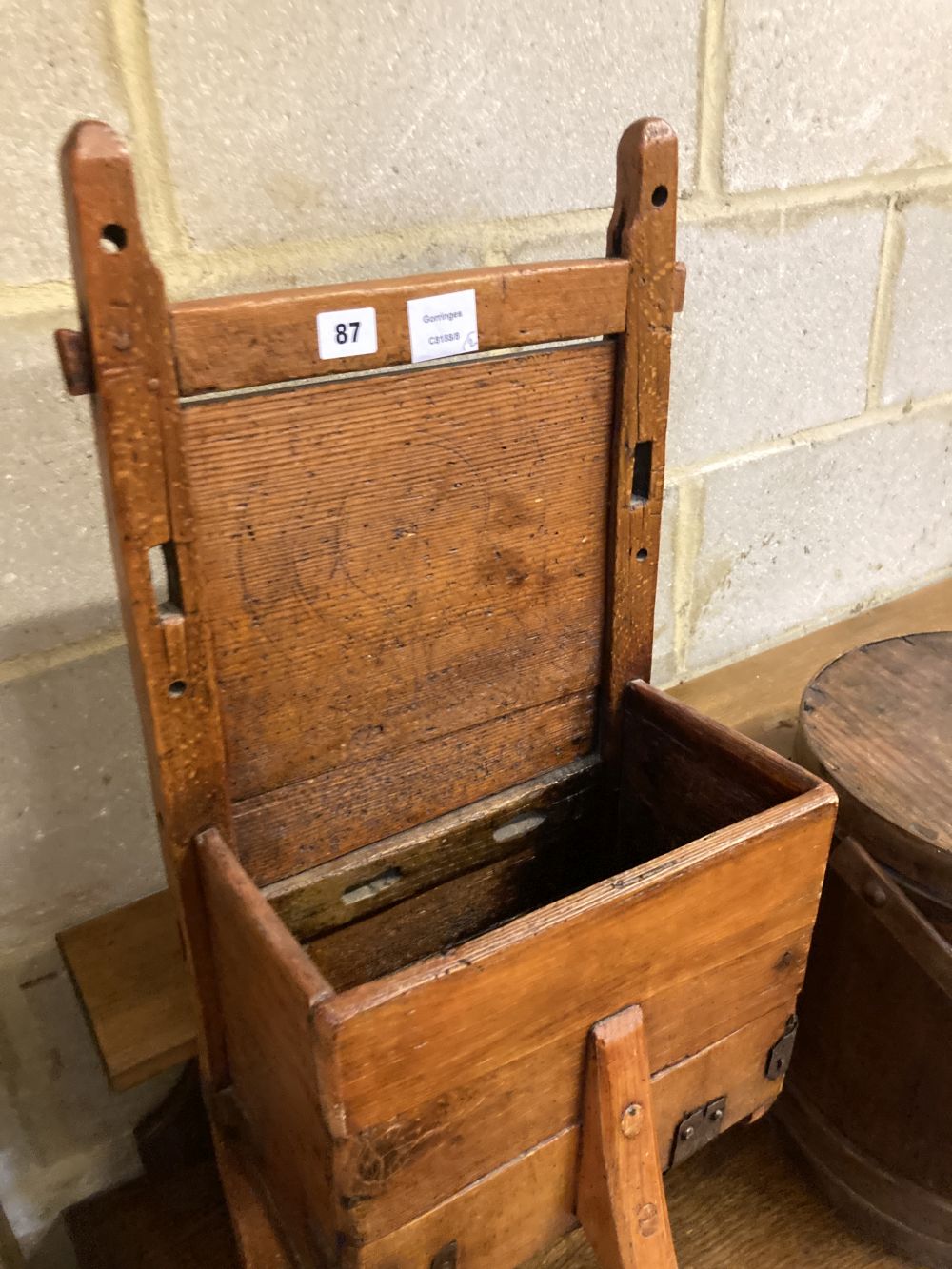 A butter box and a Swiss cheese carrier